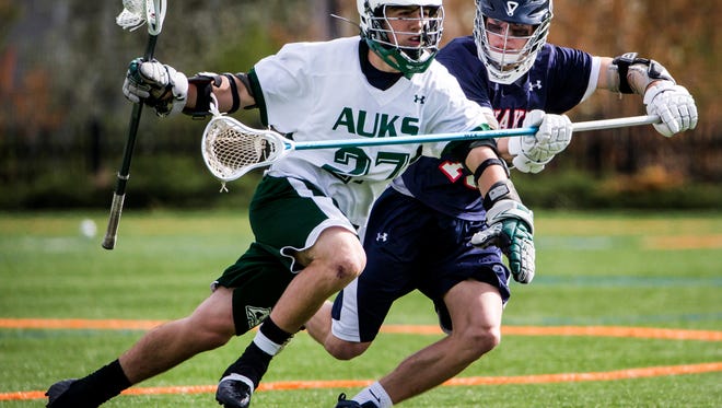 Archmere's Ben Revak (left) has been named Delaware's high school boys lacrosse Player of the Year.