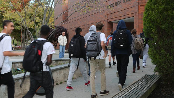 
Students enter Nyack High School about 7:15 a.m. on Oct. 10. The first bell is at 7:30, one of the earliest in the area.
