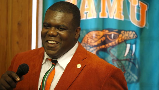 FAMU Athletic Director Milton Overton speaks during the 220 Quarterback Club meeting at the New Times Country Buffet.