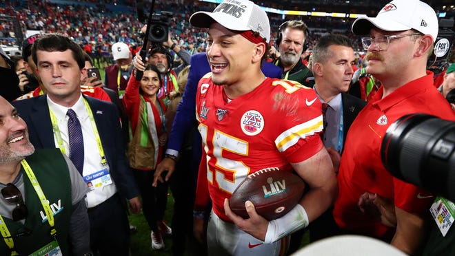 Kansas City Chiefs quarterback Patrick Mahomes (15) smiles after a victory against the San Francisco 49ers in Super Bowl 54 on Feb. 2 at Hard Rock Stadium in Miami Gardens, Fla.
