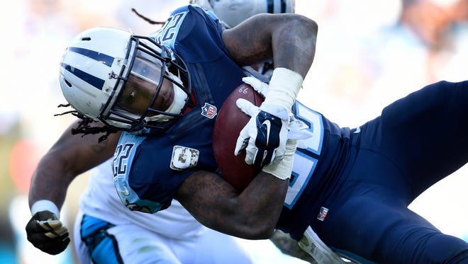 Titans running back Dexter McCluster is tackled during the fourth quarter.