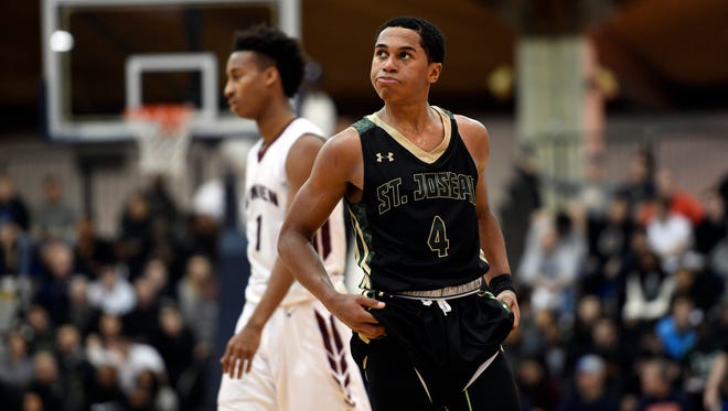 St. Joseph guard Chauncey Hawkins (4) at the end of a disappointing game for the Green Knights. Don Bosco defeated St. Joseph Regional 67-57 in the Bergen County Jamboree semifinal round at the Fairleigh Dickinson University Rothman Center in Hackensack, NJ on Sunday, February 19, 2017. 