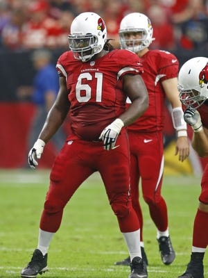 Arizona Cardinals guard Jonathan Cooper (61) against the Kansas City Chiefs in  their NFL game Sunday, Dec. 7, 2014 in Glendale.