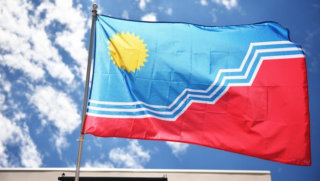 Sioux Falls flag Monday, June 4, outside of MacKenzie River Pizza, Grill & Pub.