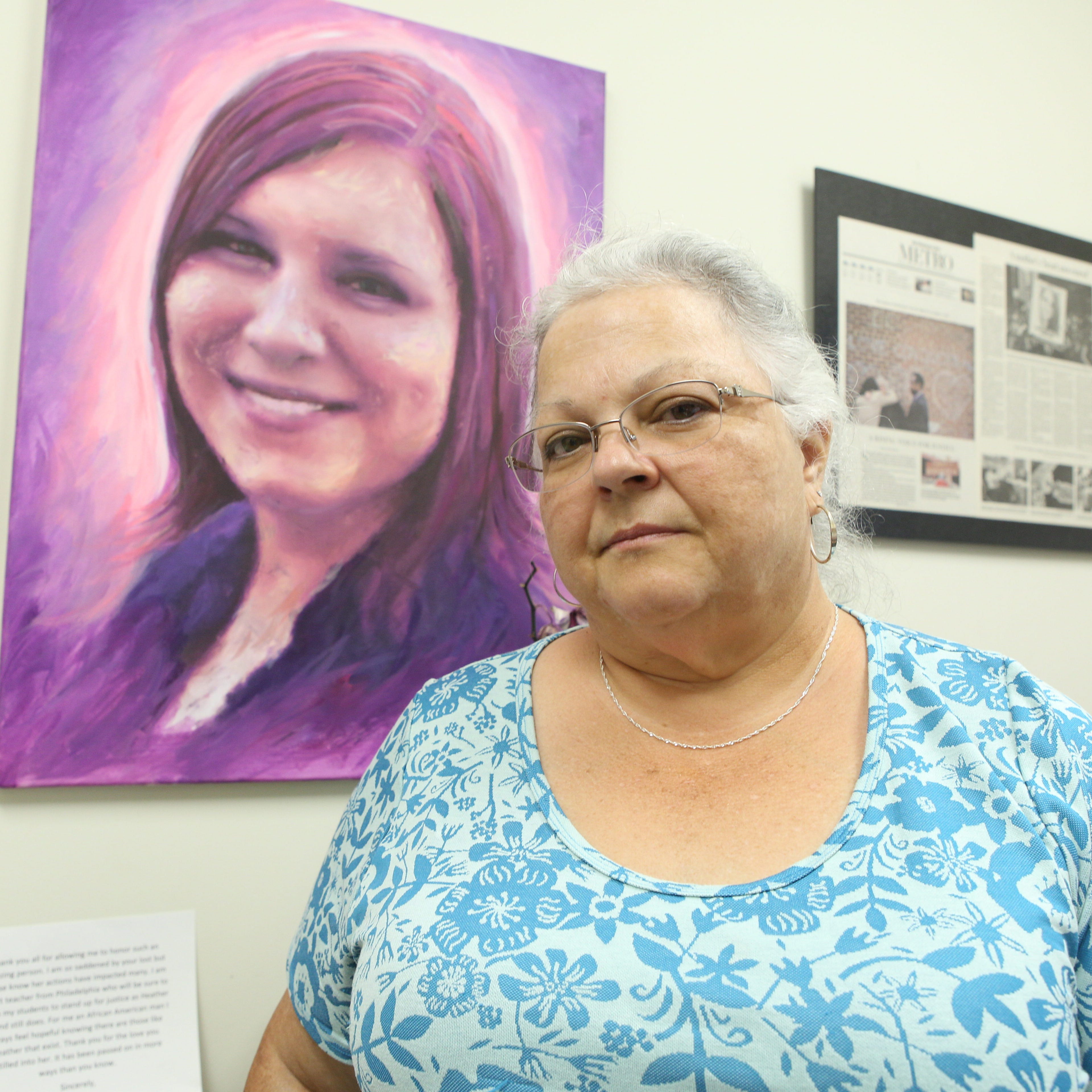 Susan Bro, the mother of Heather Heyer, who was killed in Charlottesville after being struck by a vehicle during the white nationalist riots, poses for a portrait in a room in Heyer's old law office, where her charitable foundation is now headquarter