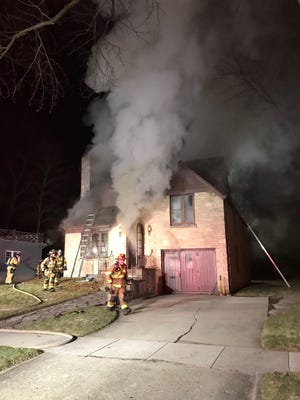 Fond du Lac firefighters battle an overnight fire Saturday April 1, 2017, at 386 Ledgeview Ave.