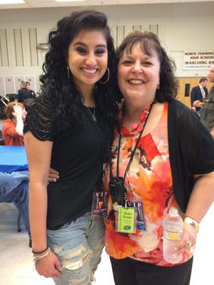 Retiring Kenbrook Principal Pam Green with former American Idol contestant Jena Irene Asciutto, a North Farmington High School graduate.
