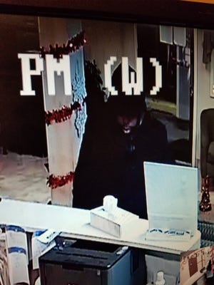 Port Huron Police are looking for information to identify a suspect in the armed robbery of the Days Inn on Pine Grove Avenue on Friday, Dec. 8.