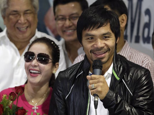 Manny Pacquiao wants to keep boxing, but wife says stop