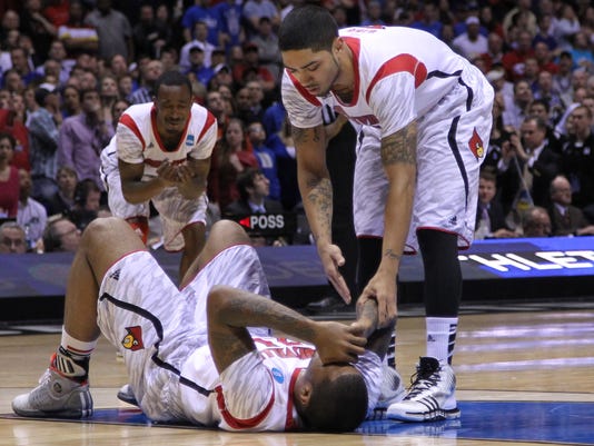 louisville basketball player fractured leg Louisville's Kevin Ware suffers gruesome leg injury, players emotional