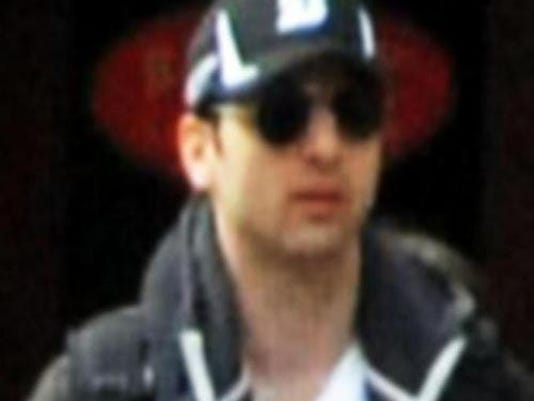 Doctors: Boston suspect died of blast and gunshot wounds