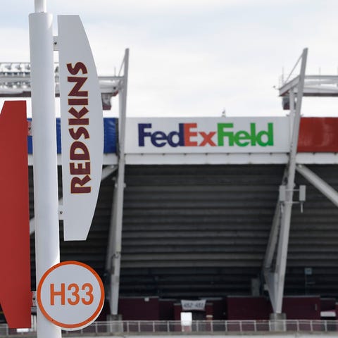 Signs for the Washington Redskins are displayed ou
