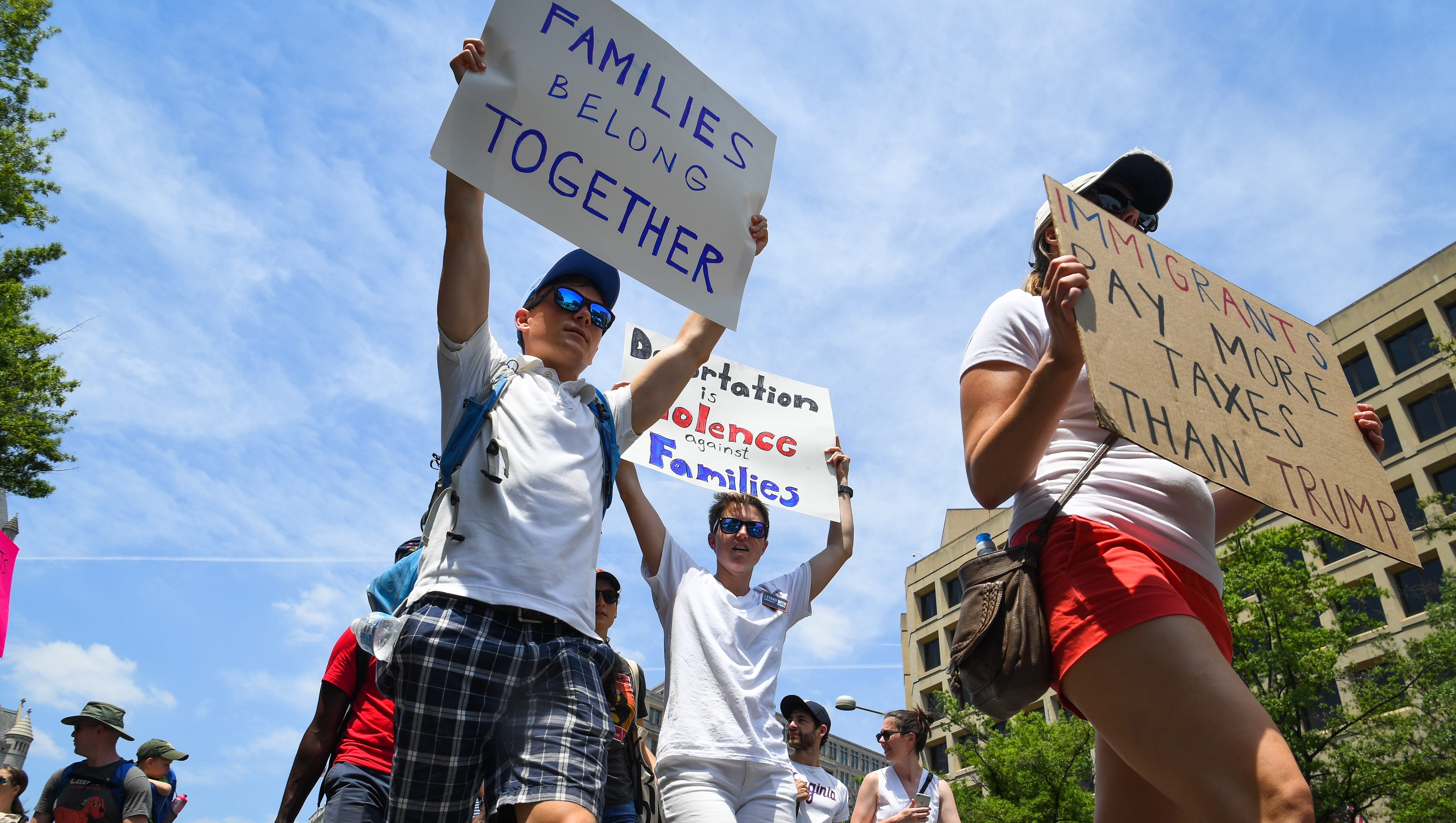 Protesters march during the Families Belong Together