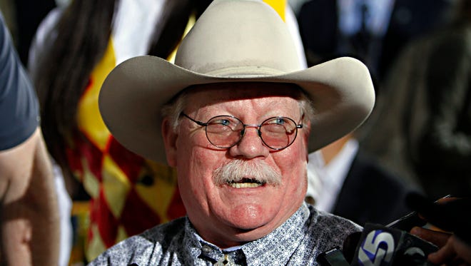 California Chrome co-owner Steve Coburn, in file photo,  was gracious as he and partner Perry Martin received the Kentucky Derby trophy for their horse's triumph in May at Churchill Downs.