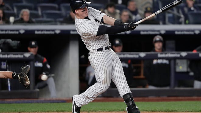 New York Yankees' Tyler Austin strikes out with the bases loaded during the sixth inning of a baseball game against the Miami Marlins on Tuesday, April 17, 2018, in New York. (AP Photo/Julie Jacobson)