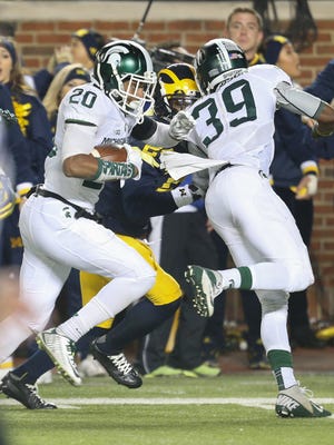 Michigan State's Jalen Watts-Jackson runs back a botched punt attempt by Michigan's Blake O'Neill for the game-winning touchdown in the final seconds of MSU's win on Oct. 17 in Ann Arbor.