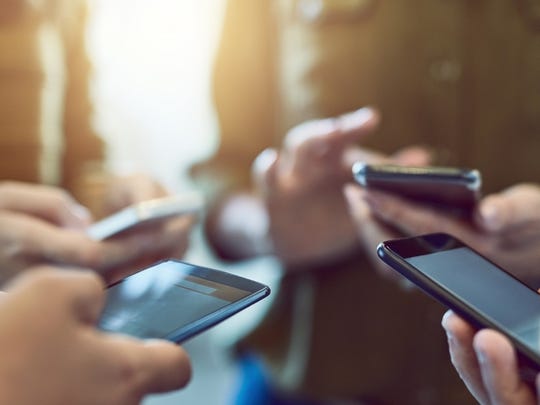 Some psychologists say it may be time to step away from your phone if you reach for it in times of anxiety or depression or mindlessly pass time by looking at your phone.