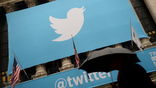 This November 7, 2013 file photo shows the logo of Twitter on the front of the New York Stock Exchange (NYSE) in New York.