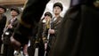 North Korean honor guards watch as Choe Ryong Hae,