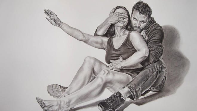"Proprietorial" is a charcoal on paper artwork by Rubi Madrid. It is among 42 student works on display as part of the Annual Juried Student Art Show at NMSU.