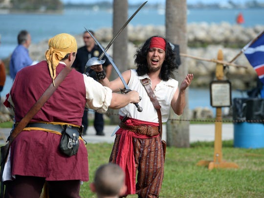 The fourth annual Vero Beach Pirate Festival is this weekend at Riverside Park. In this photo, Diego Bermudez (center), of Gainesville, and Tony Noble (left), of Largo, give a weapons demonstration on Friday, Feb. 2, 2018, at the ninth annual Treasure Coast Pirate Festival at Veterans Memorial Park in Fort Pierce.