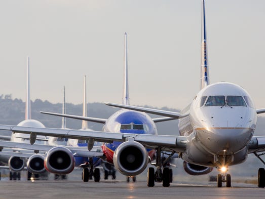 Jets line adult for depart during a early evening