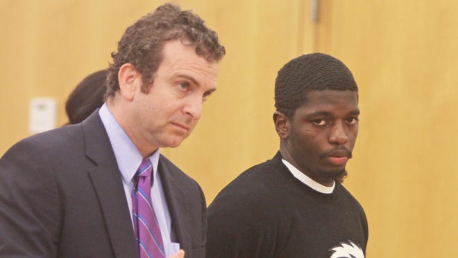 Tyrone Lee (right) during his arraignment in Westchester County Court on Sept. 14, 2014. (file photo)