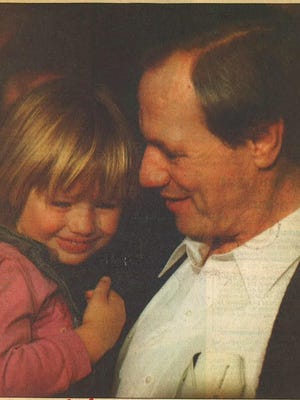 Nov 26, 1991: Tom Sutherland, above, holds Simone, the 4-year-old granddaughter he just met for the first time.
