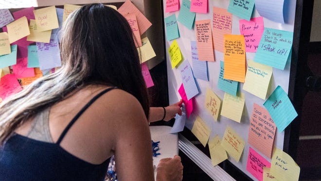 Students post thoughts after experiencing the The Lisa Project in 10 at Mt. Whitney High School on Wednesday, April 11, 2018. The Lisa Project in 10, an abbreviated version of the original, is a multi-sensory exhibit with audible and visual examples of child abuse realities. Next year the exhibit will travel to a different high school in the district.