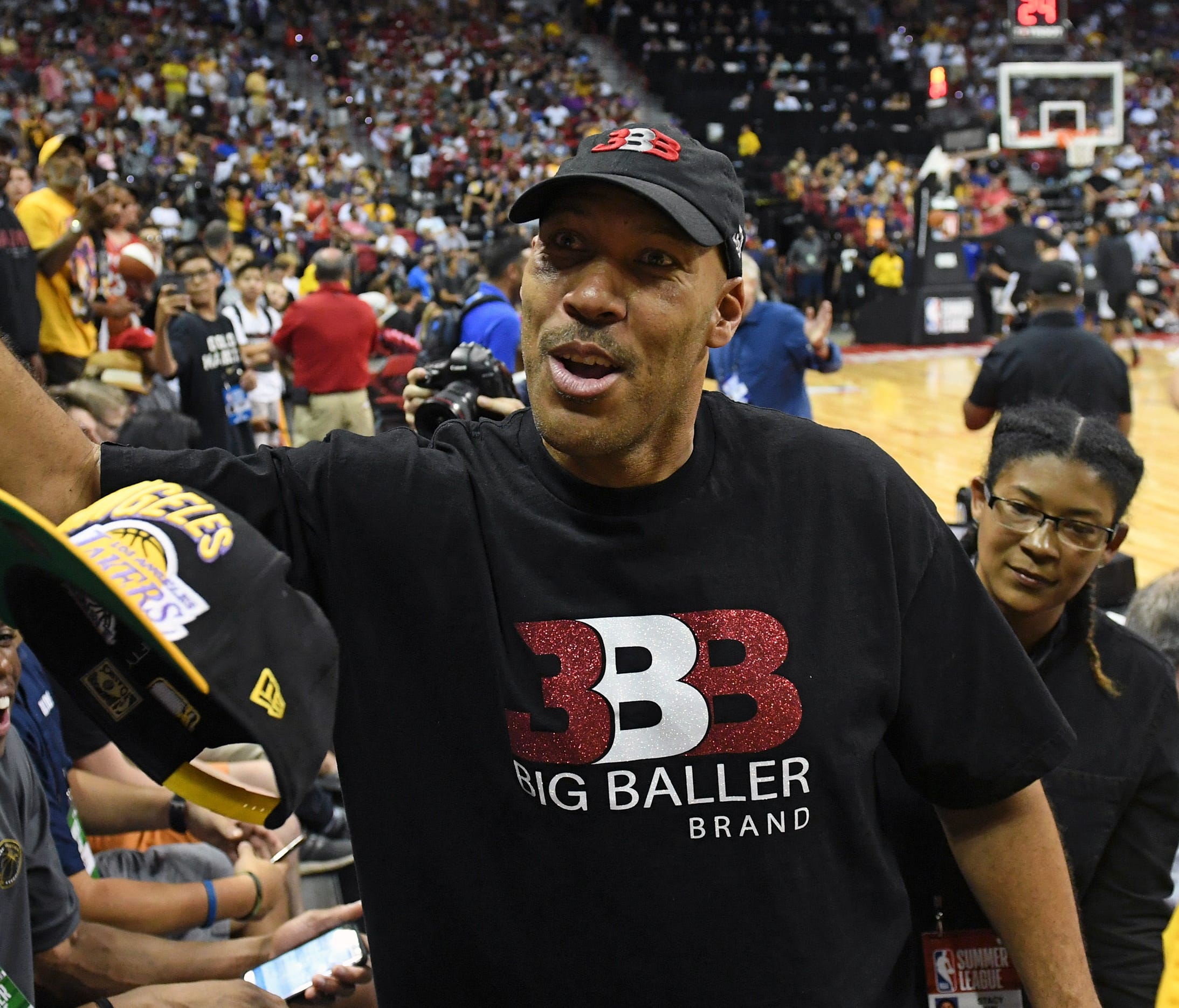 LaVar Ball, father of Lonzo Ball #2 of the Los Angeles Lakers, greets fans at halftime of a 2017 Summer League game between the Lakers and the Los Angeles Clippers at the Thomas & Mack Center on July 7, 2017 in Las Vegas, Nevada.