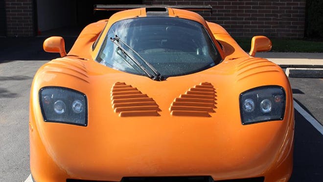 A 2009 Mosler MT900S sports car is among the 20-plus vehicles to be auctioned off online Thursday by the U.S. Marshals Service as part of a $4 million embezzlement\ case.