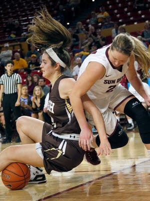 Lehigh’s Kerry Kinek (left) collides with Arizona State’s Kelsey Moos during the first half on Saturday.