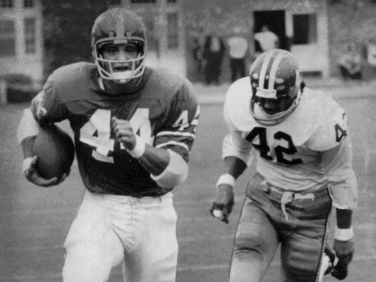 Cornell University running back Ed Marinaro races for