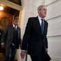 Former FBI Director Robert Mueller, front, the special