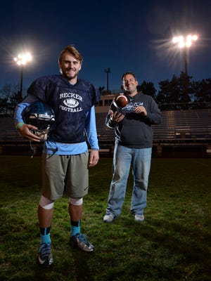 Both current Becker Bulldogs senior Andrew Stanger, left, and his father, Corey, photographed Monday, Nov. 9, have quarterbacked the team to state football tournament appearances. Corey led the Bulldogs to state in 1994 and, although the team lost, Corey has higher hopes for the current team.