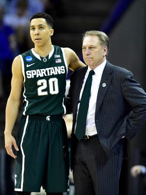 Michigan State head coach Tom Izzo with star guard Travis Trice. "(Trice) was too skinny," Izzo said. "He was too small. He was too this and too that. But, unbelievable family, a dad who's a coach, just an ability to win."
