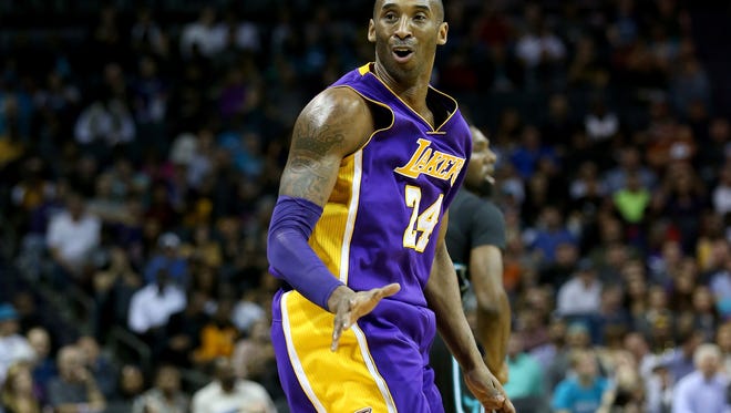 Kobe Bryant #24 of the Los Angeles Lakers during their game at Time Warner Cable Arena on December 28, 2015 in Charlotte, North Carolina.  NOTE TO USER: User expressly acknowledges and agrees that, by downloading and or using this photograph, User is consenting to the terms and conditions of the Getty Images License Agreement.  (Photo by Streeter Lecka/Getty Images)