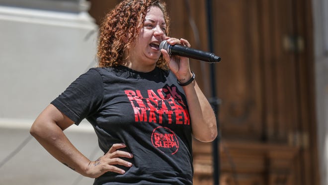 Satchuel Cole, vice president of Don't Sleep speaks outside the Indiana Statehouse during the "We Demand Justice!" rally for Aaron Bailey an unarmed black man who was killed June 29 2017 by Indianapolis Metropolitan Police Department officers, Saturday July 15, 2017. The rally was organized by DONT SLEEP.
