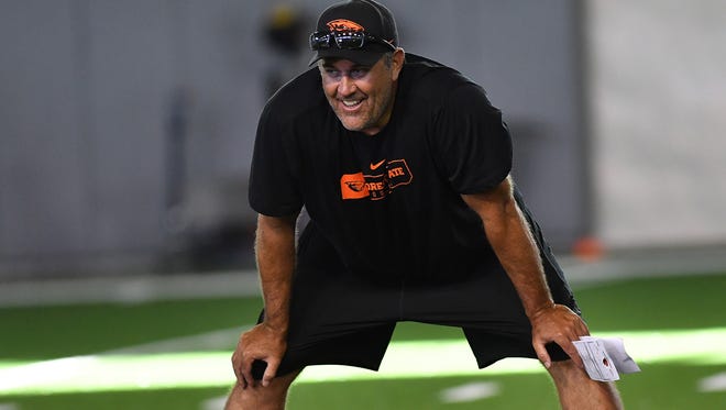 OSU defensive coordinator Kevin Clune employs a vocal coaching style.