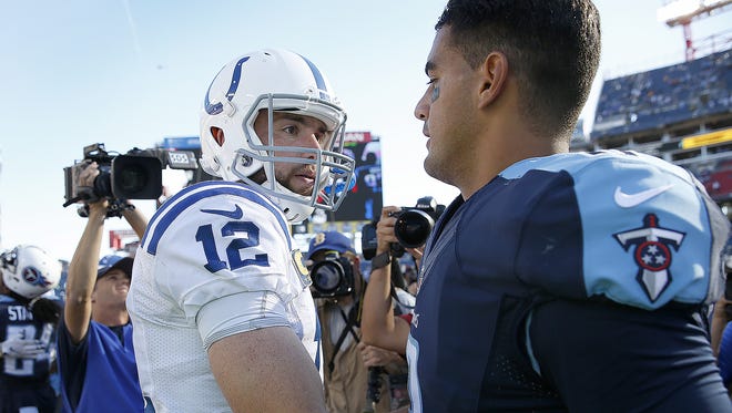 Indianapolis Colts quarterback Andrew Luck (12) greets Tennessee Titans quarterback Marcus Mariota (8) following their game Sunday, October 23, 2016, at Nissan Stadium in Nashville TN. The Colts defeated the Titans 34-26.