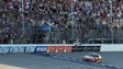 Kyle Larson takes the checkered flag to win the NASCAR