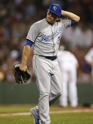 Kansas City Royals pitcher Kris Medlen walks off the field at the end of the sixth inning Thursday in Boston.