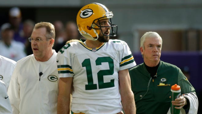 Green Bay Packers quarterback Aaron Rodgers (12) yells after walking back to the sideline following hit by Minnesota Vikings outside linebacker Anthony Barr that broke his collarbone during the first quarter of their game against the Minnesota Vikings Sunday, October 5, 2017 at U.S. Bank Stadium in Minneapolis, Minn.