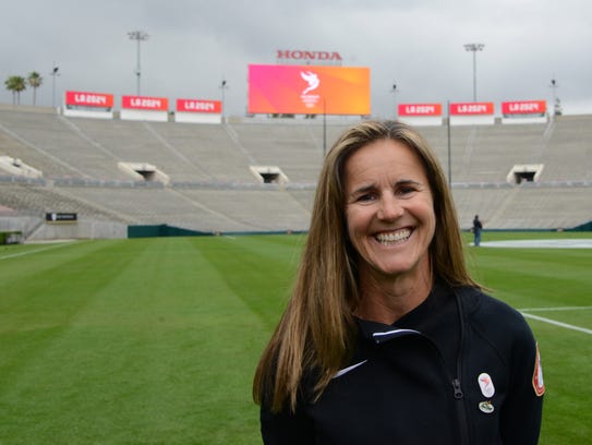 Brandi Chastain poses at the Rose Bowl in May. The
