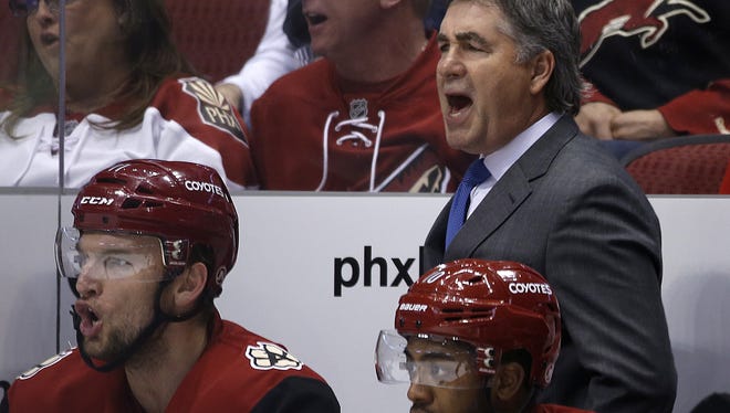 Coyotes' head coach Dave Tippett watches over his team in the second period against the Stars at Gila River Arena in Glendale on Thursday, March 24, 2016.