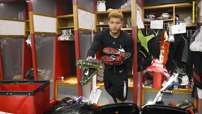 Arizona Cardinals safety Tyrann Mathieu cleans out his locker at the team's training facility in Tempe on Jan. 25, 2016.