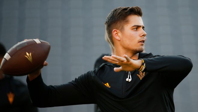 Brady White (2) throws passes before an ASU game at Sun Devil Stadium in Tempe, Ariz. on August 31, 2017.