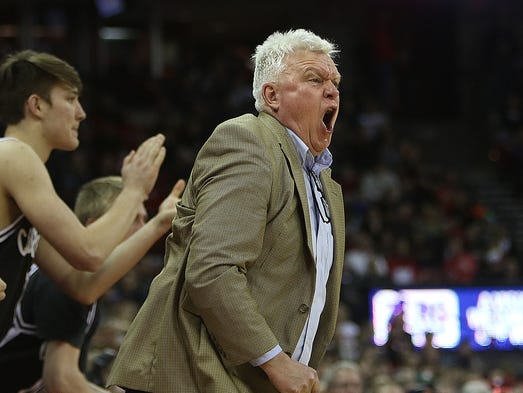 Cedarburg head coach Tom Diener reacts to a referee's