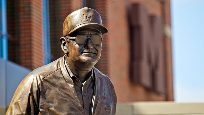 A statue of Bo Schembechler is at the entrance to Schembechler Hall.