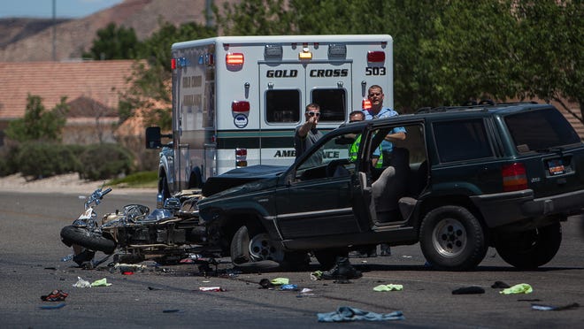 
Debris fills the scene Saturday of an accident involving three motorcyclists and a Jeep on Riverside Drive in St. George. Police reported Sunday that one of the victims had died.
